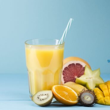 summer-fruit-juice-blue-background